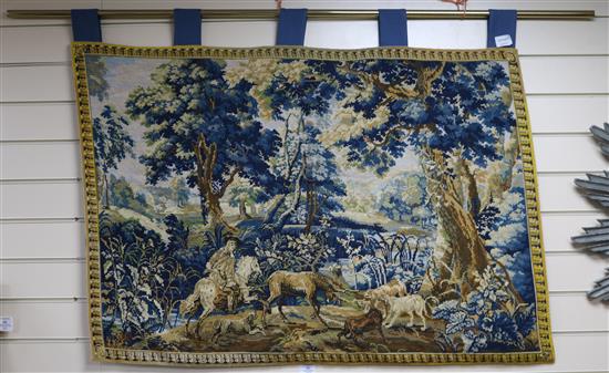 A needlework verdure tapestry, H.80cm, W.114cm